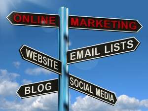 Online Marketing Signpost Showing Blogs Websites Social Media And Email Lists